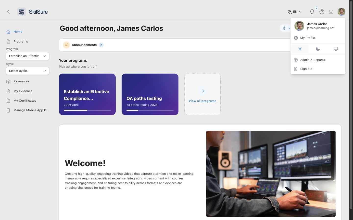 The account menu open in the top-right corner, showing My Profile, the theme switcher, Admin & Reports, and Sign out.