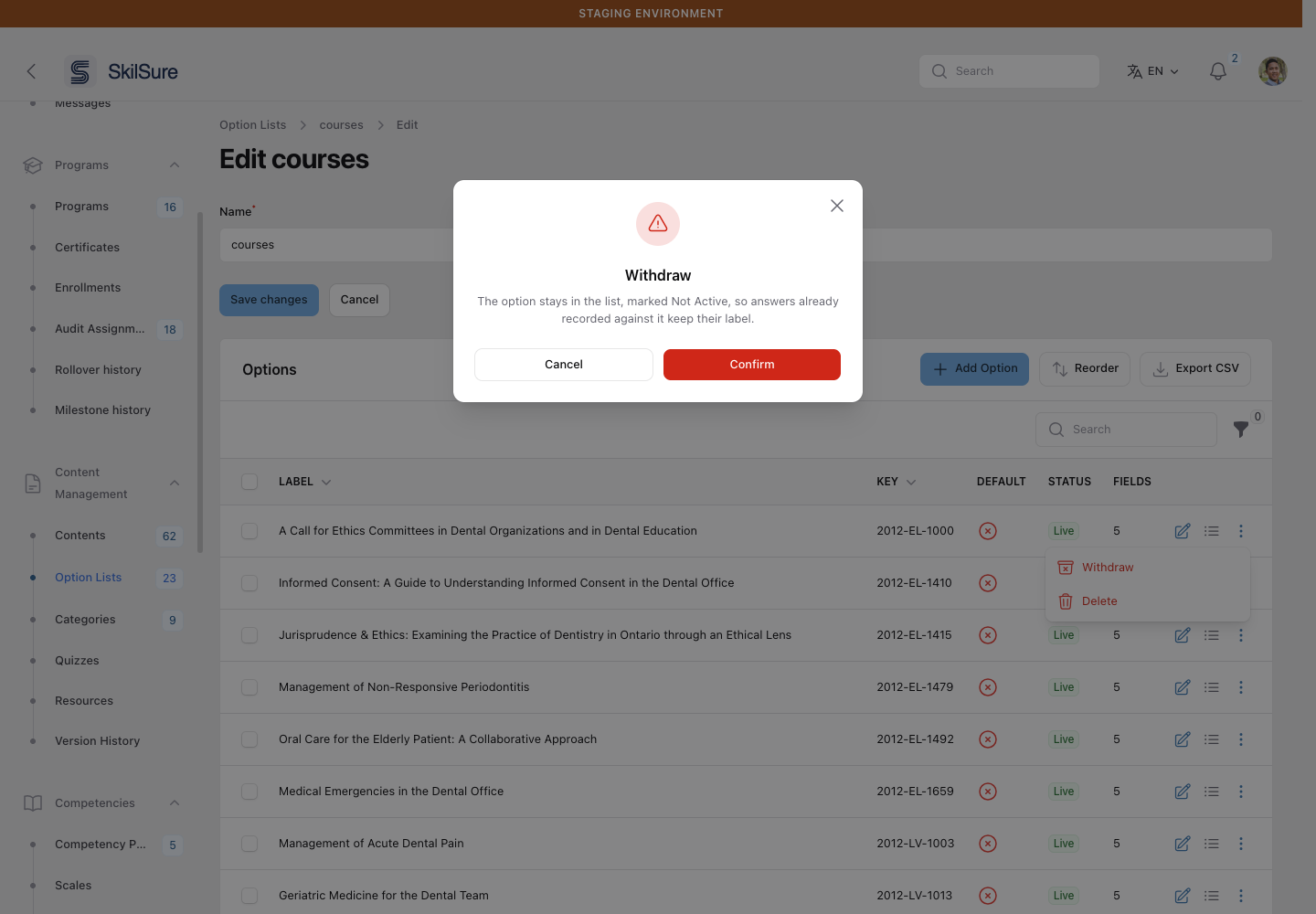 The Withdraw confirmation window, explaining that the option stays in the list marked Not Active so answers already recorded against it keep their label.