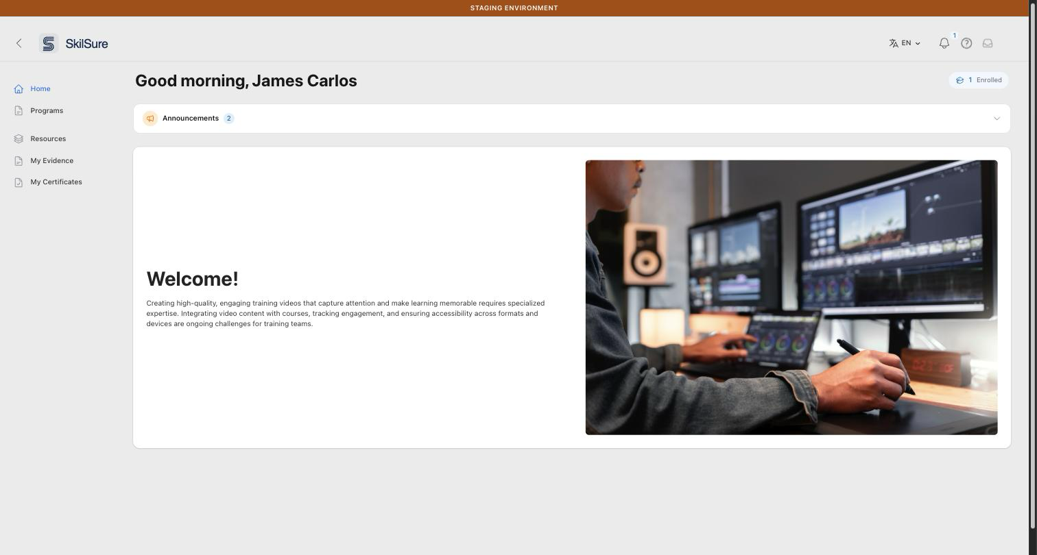 Portal home page. Below the "Good morning" greeting, a collapsed Announcements bar shows a megaphone icon, the word Announcements, and a badge with the number 2.