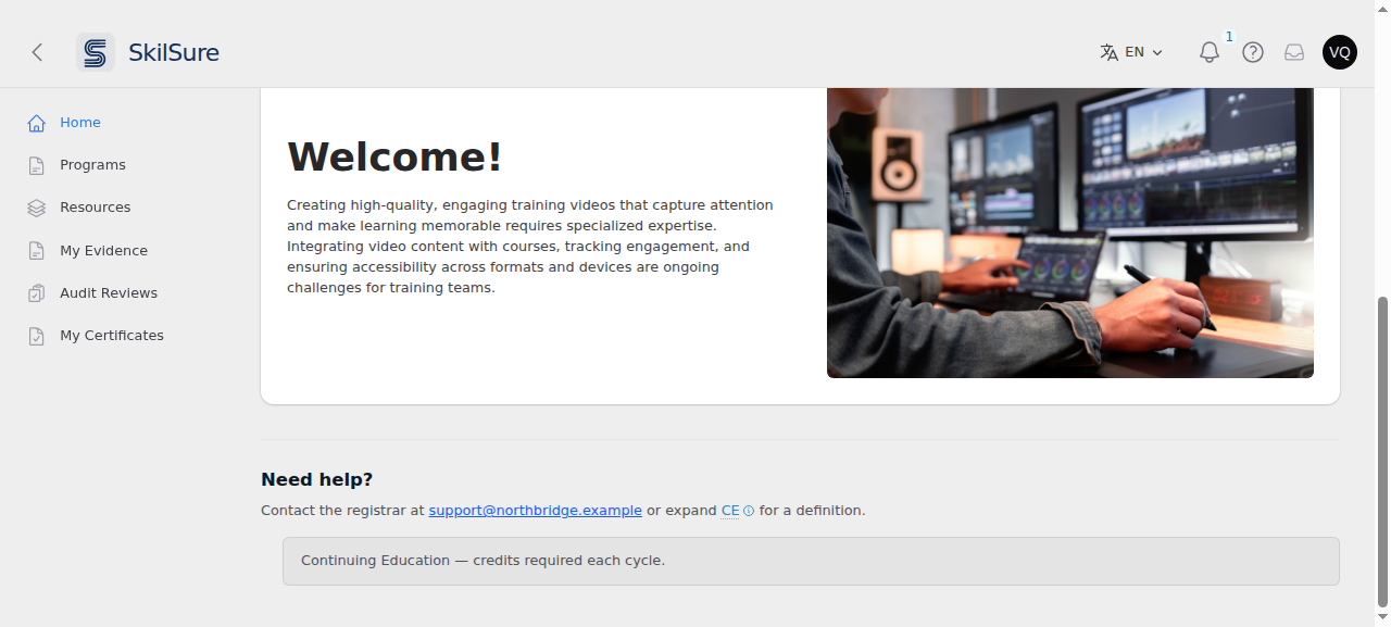 User home page scrolled to the bottom, showing the site footer below the welcome card with a heading, a support email link, and an expanded collapsible definition.